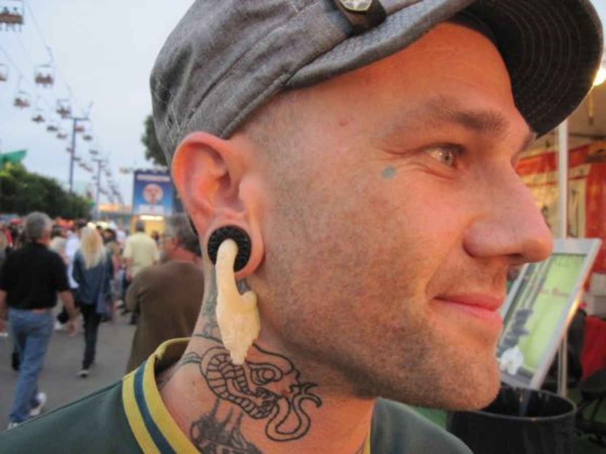 kifeszített füllebeny piercing