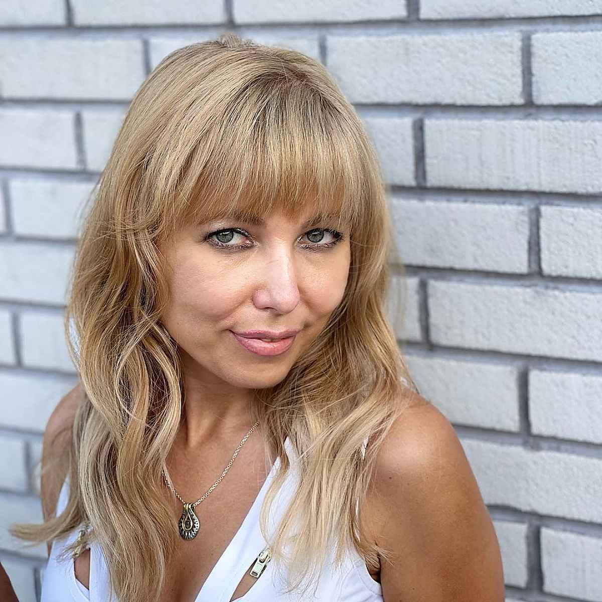 honningblonde høydepunkter på lengre hår