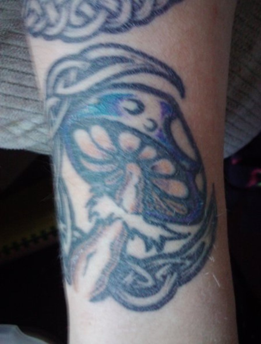 tatovering-symbolikk-slanger-sopp-måner